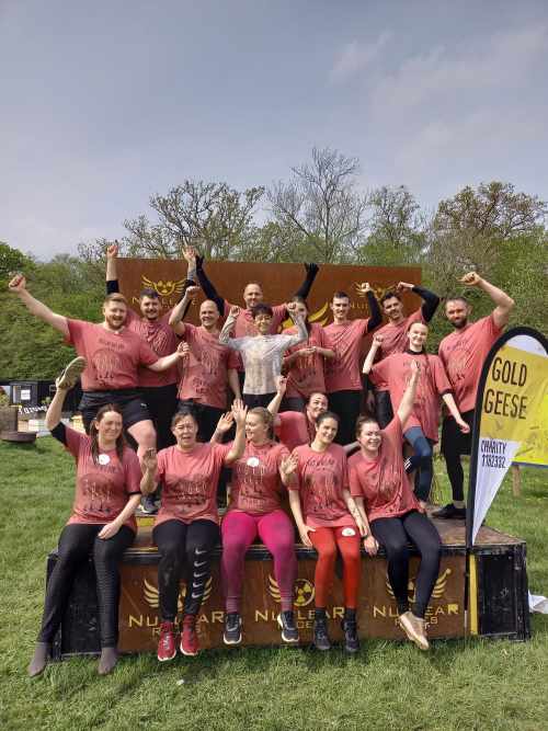 A MUDDY obstacle course fundraising event has raised over £4,200 for Gold Geese, a Leigh charity supporting families affected by childhood cancer.