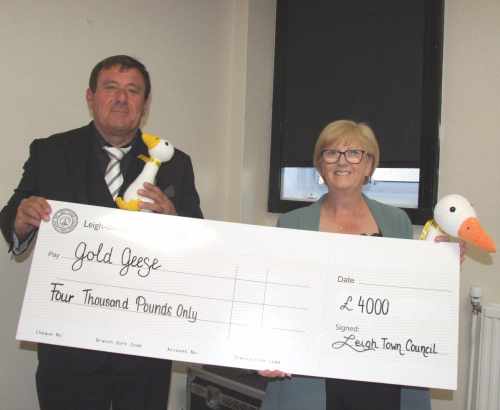 Leigh News. Following Coun Arscott’s election, Mr Evans made a presentation of £4,000 to Gold Geese (https://www.goldgeese.org), the charity he had chosen to support during his time as Chair.