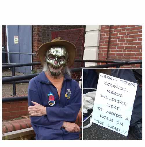 Leigh On Sea News. Protest Against Politics - LEIGH Town Council’s (LTC) Coun Alan Hart has staged a one man protest outside Leigh Community Centre, dressed as a ‘demon’ and with a sign reading 'Leigh Town Council needs politics like it needs a hole in the head.'